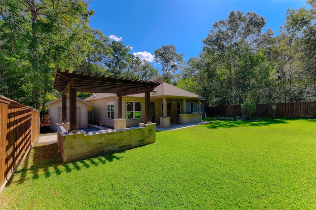 rear view of house featuring a pergola, a lawn, and a patio area