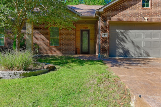 ranch-style house with a front yard and a garage