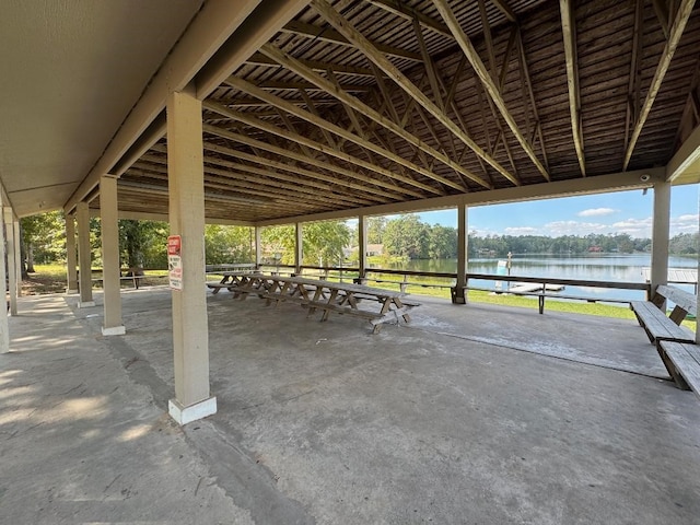 view of patio with a water view