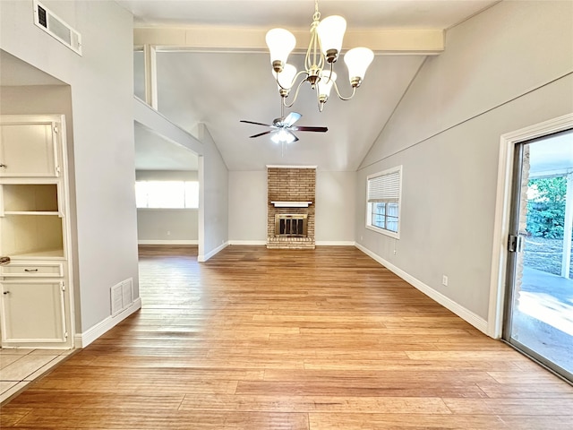 unfurnished living room featuring light hardwood / wood-style flooring and a healthy amount of sunlight