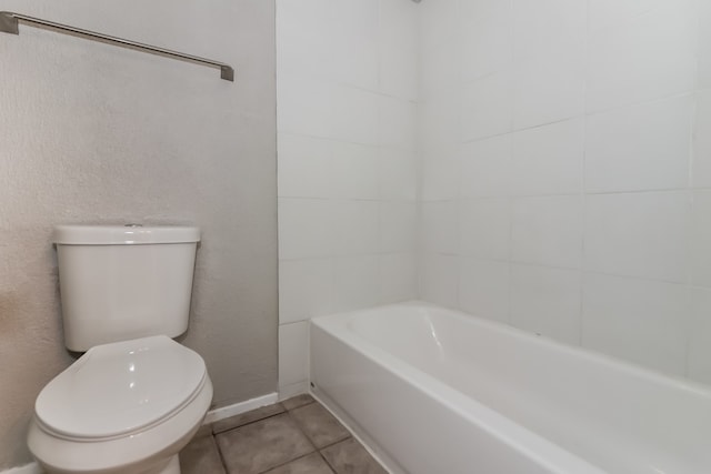 bathroom with tile patterned flooring and toilet