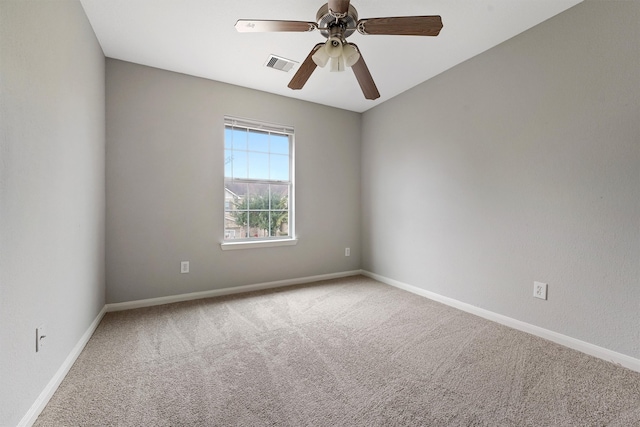 carpeted empty room with ceiling fan