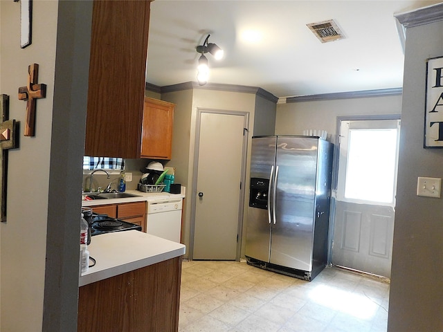 kitchen featuring stainless steel fridge with ice dispenser, dishwasher, crown molding, sink, and electric range