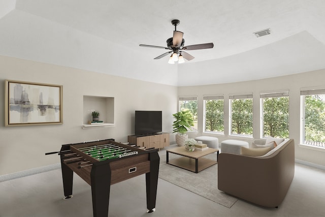 rec room featuring light carpet and ceiling fan