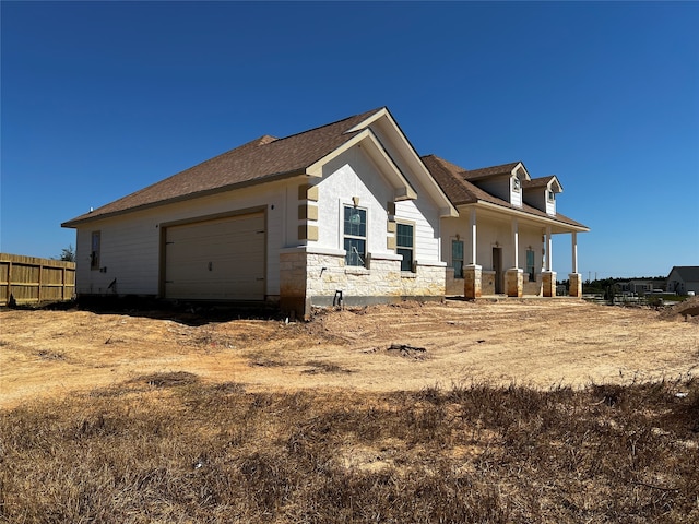 view of front of property featuring a garage