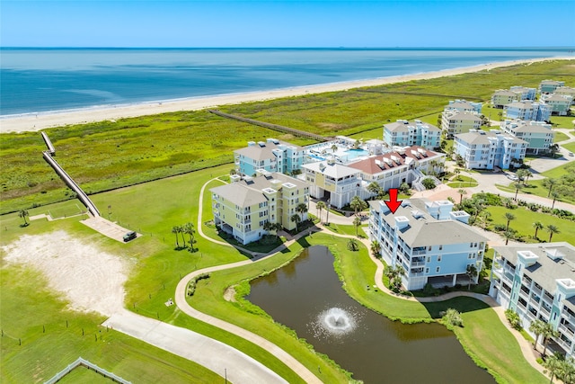 bird's eye view with a view of the beach and a water view