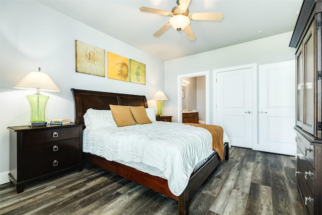 4131 Pointe W Dr Unit 302, Galveston, TX 77554 - bedroom featuring dark wood-style floors, ensuite bath, a ceiling fan, and a closet