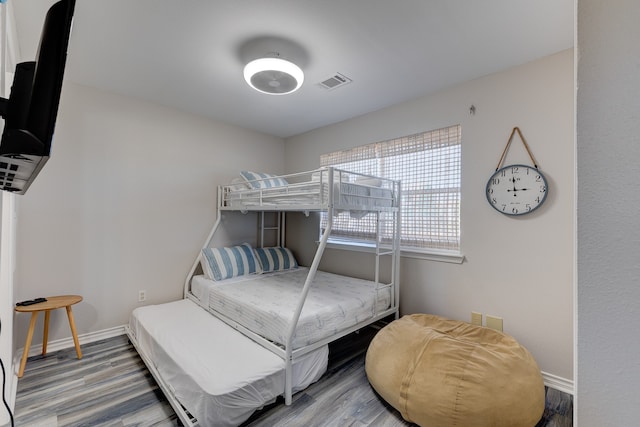 bedroom featuring hardwood / wood-style flooring