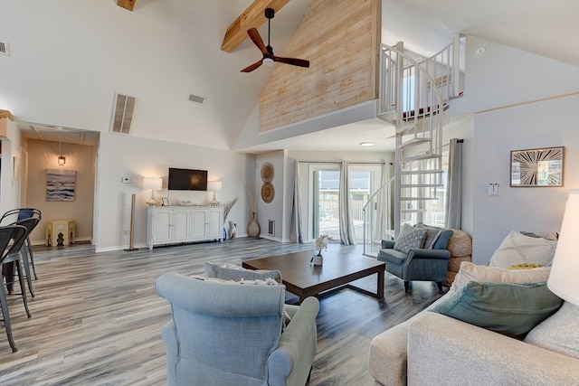 2332 Martinique, Crystal Beach, TX 77650 - living room with attic access, high vaulted ceiling, ceiling fan, light wood-style floors, and beamed ceiling