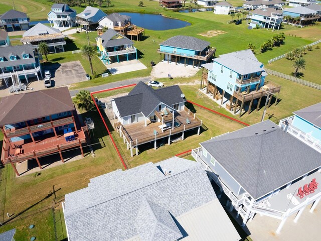 2332 Martinique, Crystal Beach, TX 77650 - aerial view of residential area with a nearby body of water and property parcel outlined
