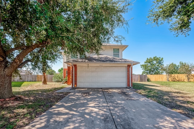 exterior space featuring a yard and a garage