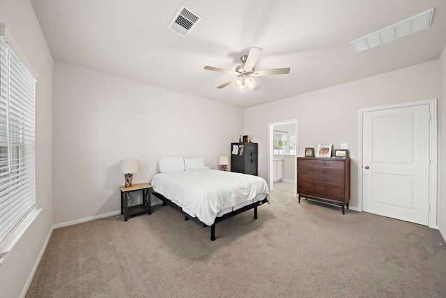 bedroom featuring ceiling fan and carpet