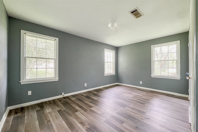 empty room featuring light hardwood / wood-style floors