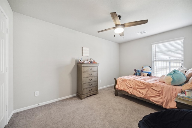 bedroom with light colored carpet and ceiling fan