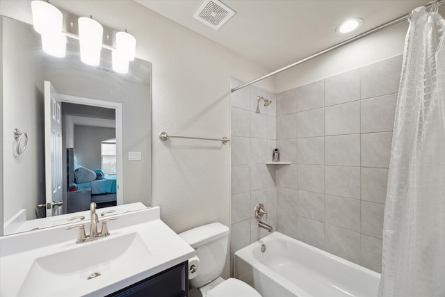 full bathroom with vanity, toilet, and shower / bathtub combination with curtain