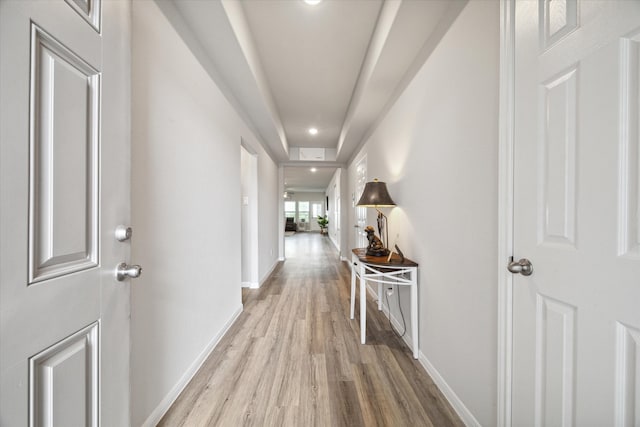 corridor featuring light hardwood / wood-style flooring