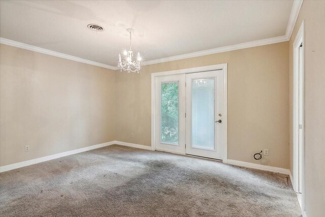 3301 Pelican St, Orange, TX 77630 - carpeted empty room featuring an inviting chandelier, ornamental molding, baseboards, and visible vents