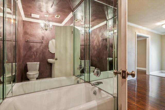 3301 Pelican St, Orange, TX 77630 - full bath with a bath, visible vents, toilet, and crown molding