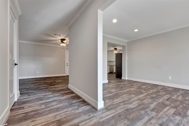 unfurnished room with hardwood / wood-style floors, crown molding, and ceiling fan