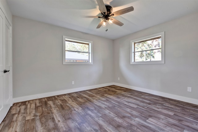 empty room with wood-type flooring and ceiling fan