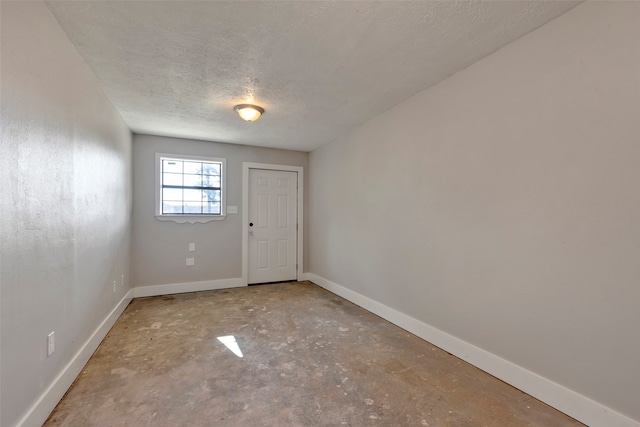 interior space featuring a textured ceiling