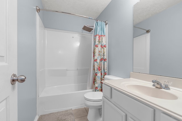 full bathroom featuring shower / bath combination with curtain, a textured ceiling, tile patterned floors, vanity, and toilet