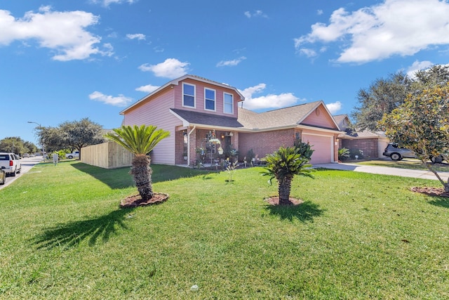 front of property featuring a front yard and a garage