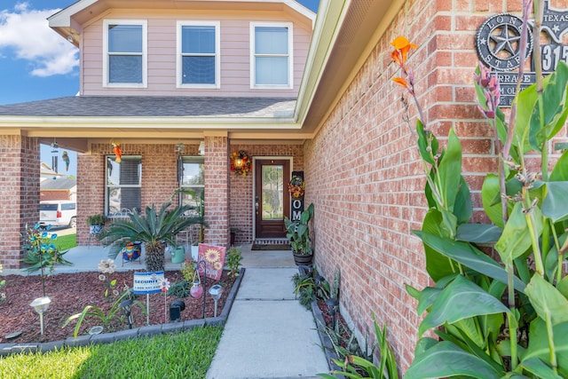 entrance to property with covered porch