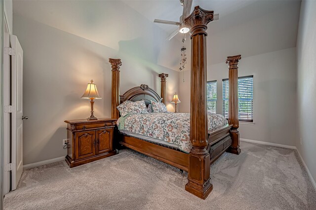 carpeted bedroom with lofted ceiling and ceiling fan