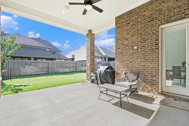 view of patio featuring ceiling fan and grilling area