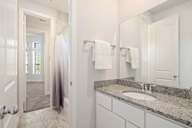 bathroom with vanity and shower / bathtub combination with curtain