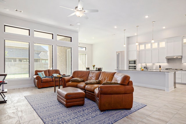 living room featuring ceiling fan