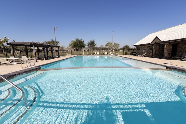 view of pool with a pergola