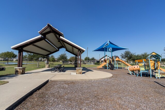 view of jungle gym with a lawn