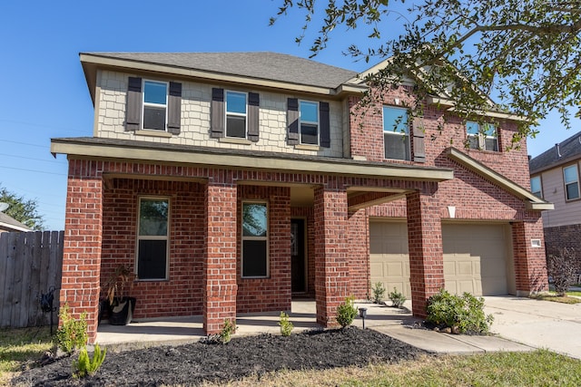 view of front of property with a garage