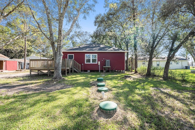 view of yard featuring a wooden deck