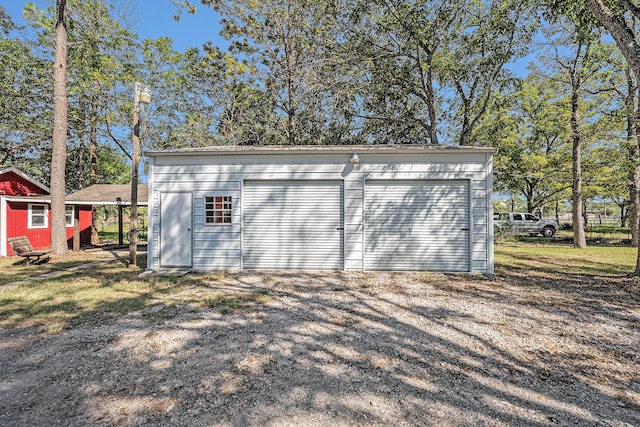 view of outdoor structure featuring a garage