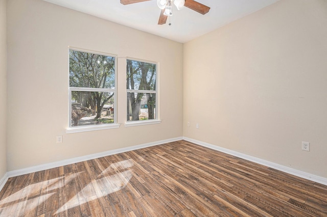 unfurnished room featuring hardwood / wood-style flooring and ceiling fan