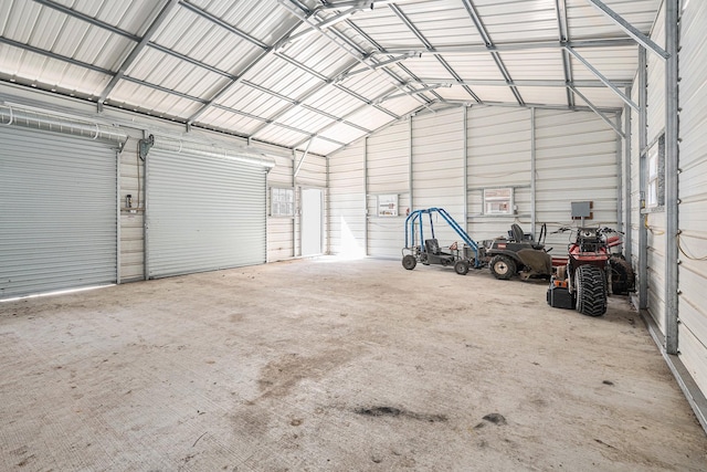 garage featuring a carport