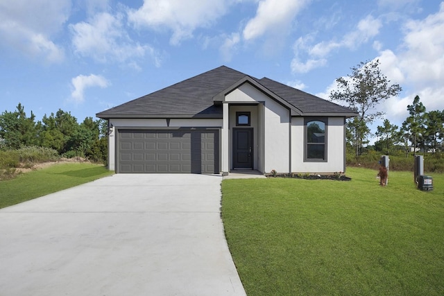 801 Rd 5812, Cleveland, TX 77327 - view of front of home with an attached garage, concrete driveway, a shingled roof, and a front yard