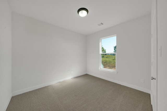 empty room featuring carpet flooring