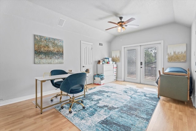 office space featuring lofted ceiling, ceiling fan, french doors, and wood-type flooring