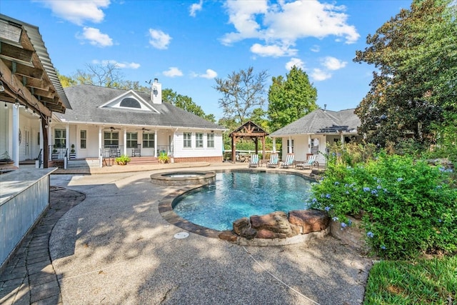 view of pool with a gazebo, an in ground hot tub, and a patio