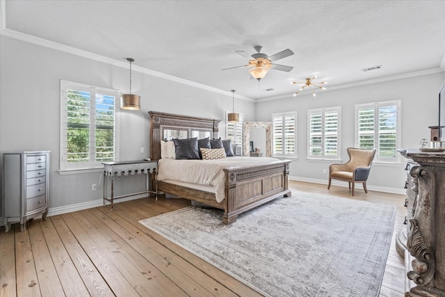 bedroom with light hardwood / wood-style floors, crown molding, multiple windows, and ceiling fan