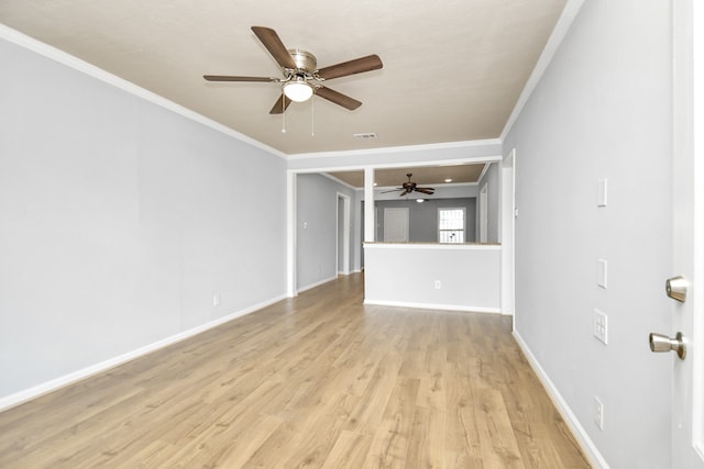 unfurnished living room featuring ornamental molding, light hardwood / wood-style floors, and ceiling fan