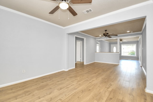 unfurnished living room featuring light hardwood / wood-style flooring, ceiling fan, and ornamental molding