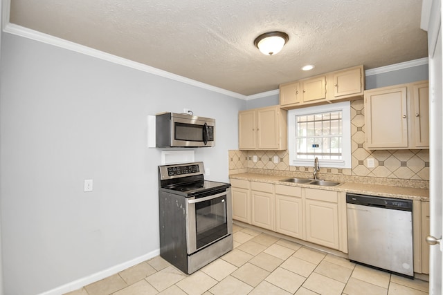 kitchen featuring ornamental molding, backsplash, appliances with stainless steel finishes, and sink