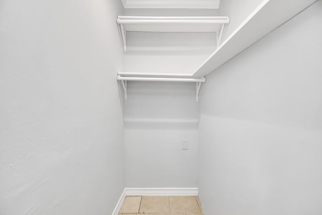 225 N Carolina St, Houston, TX 77029 - walk in closet with tile patterned flooring