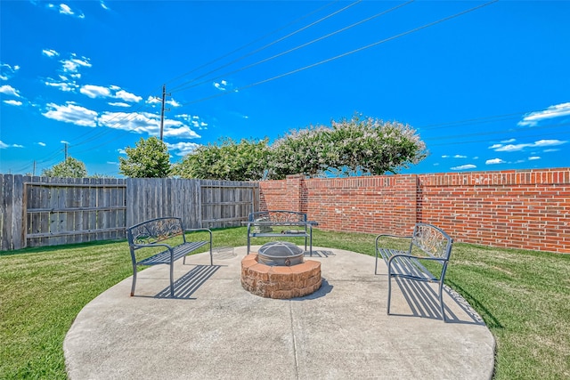 view of patio / terrace featuring an outdoor fire pit