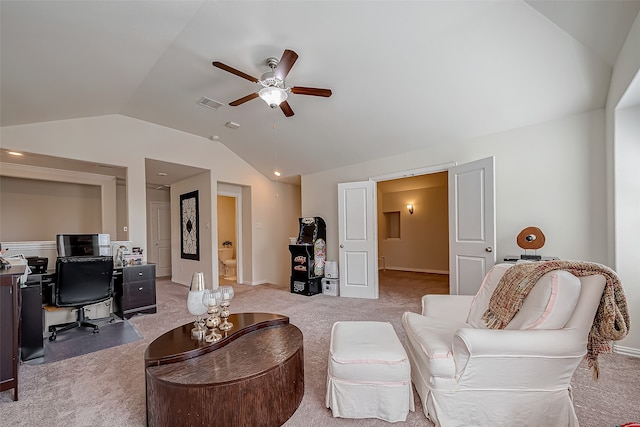 living room featuring lofted ceiling, ceiling fan, and light colored carpet